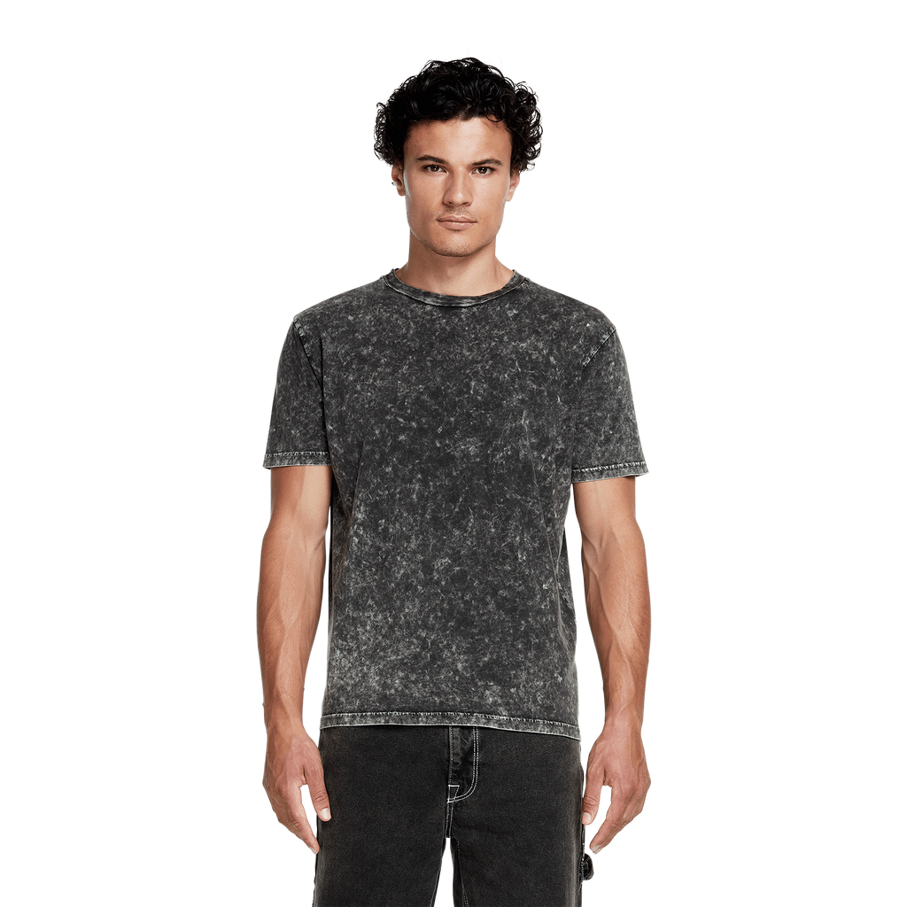 Earth Positive® Jersey T-Shirt EP01 worn by a model, showcasing a casual, eco-friendly cotton T-shirt in natural light.