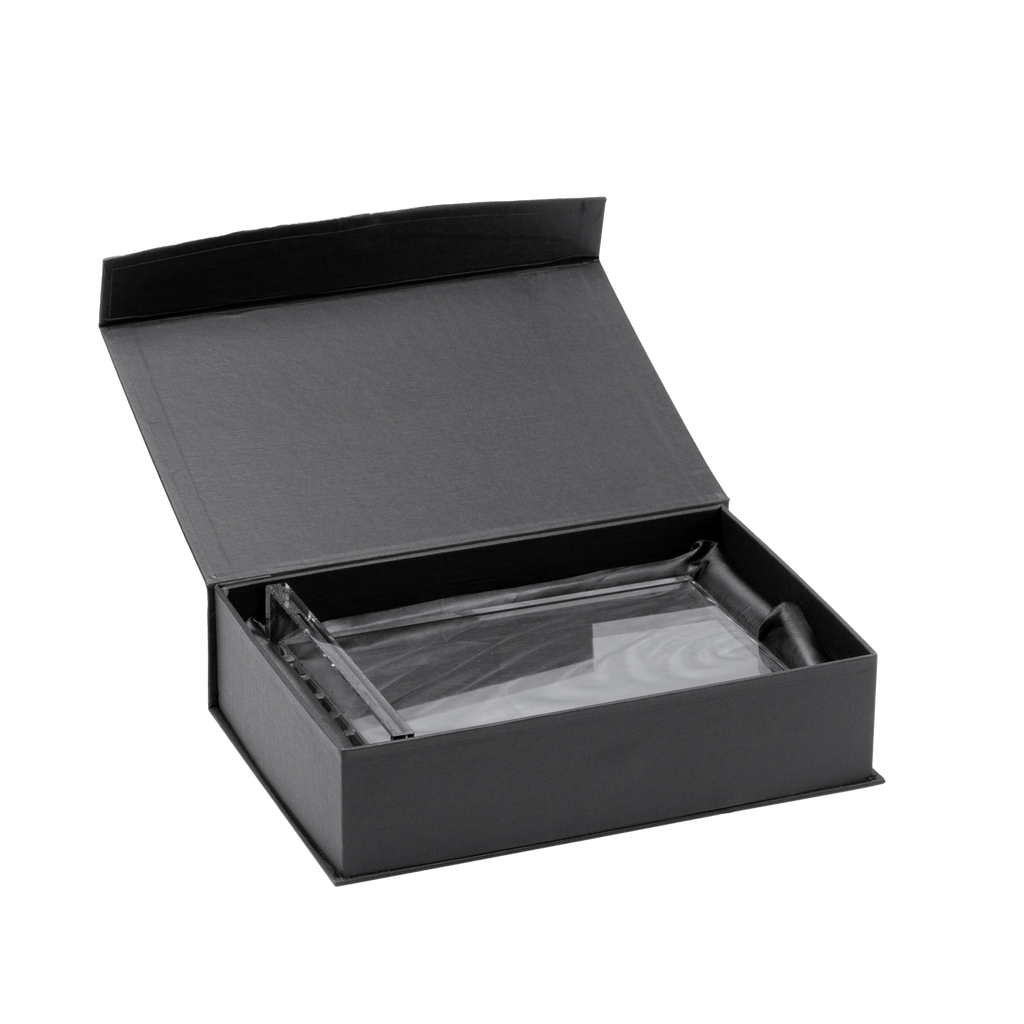 Elegant glass award with laser engraving, perfect for a special gift, showcasing intricate design and high-quality craftsmanship.