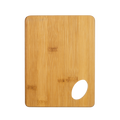 Personalized bamboo kitchen cutting board by Kombis, ideal as a custom gift, showing a smooth bamboo surface with engraved design.