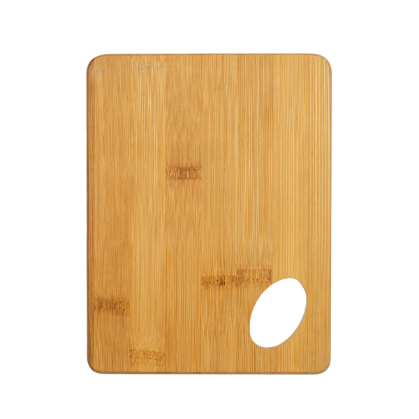 Personalized bamboo kitchen cutting board by Kombis, ideal as a custom gift, showing a smooth bamboo surface with engraved design.