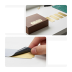 Personalized gold-colored gift plaque with laser engraving, featuring intricate details and a custom message on the surface.