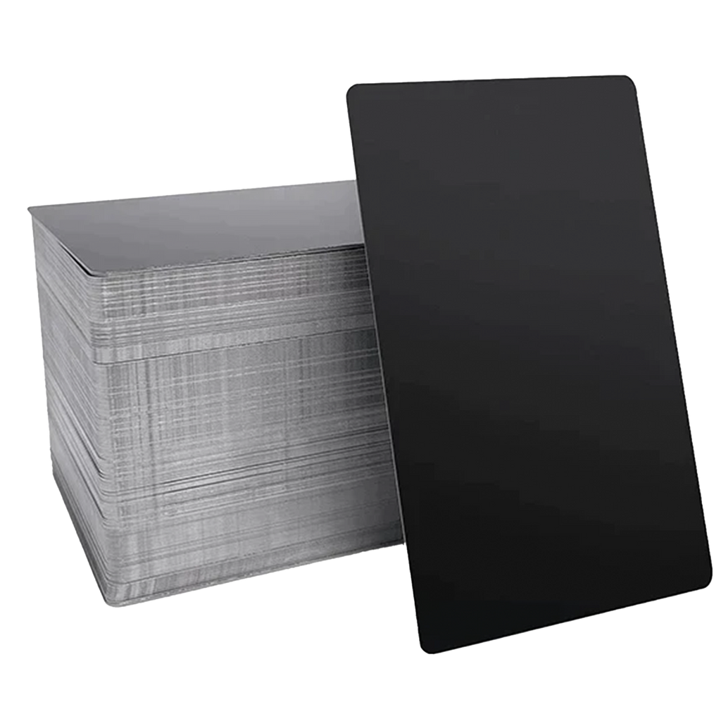 Set of 10 metal business cards with laser engraving by Kombis, showcasing sleek design and professional craftsmanship.