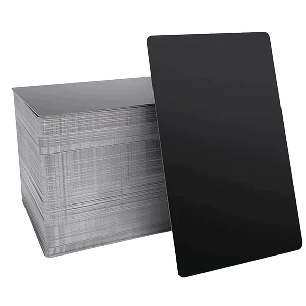 Set of 10 metal business cards with laser engraving by Kombis, showcasing sleek design and professional craftsmanship.
