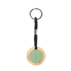 Personalized natural wood keychain gift featuring engraved design, crafted by Kombis, with a smooth wooden surface and keyring attachment.